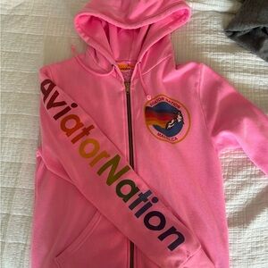 Woman’s Aviator Nation pink zip up hoodie. Excellent used condition